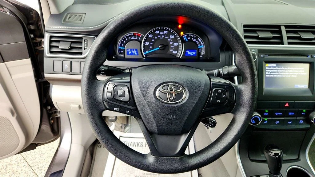 Used 2015 Predawn Gray Mica Toyota 4dr Sedan I4 Automatic LE image 13