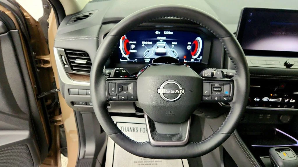 Used 2025 Baja Storm Metallic/Super Black Nissan AWD Platinum w/ ProPILOT Assist 2.1 & Head-Up Display image 14