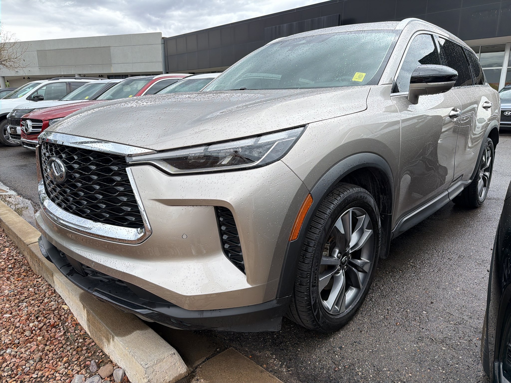 Used 2023 Warm Titanium INFINITI LUXE image 1