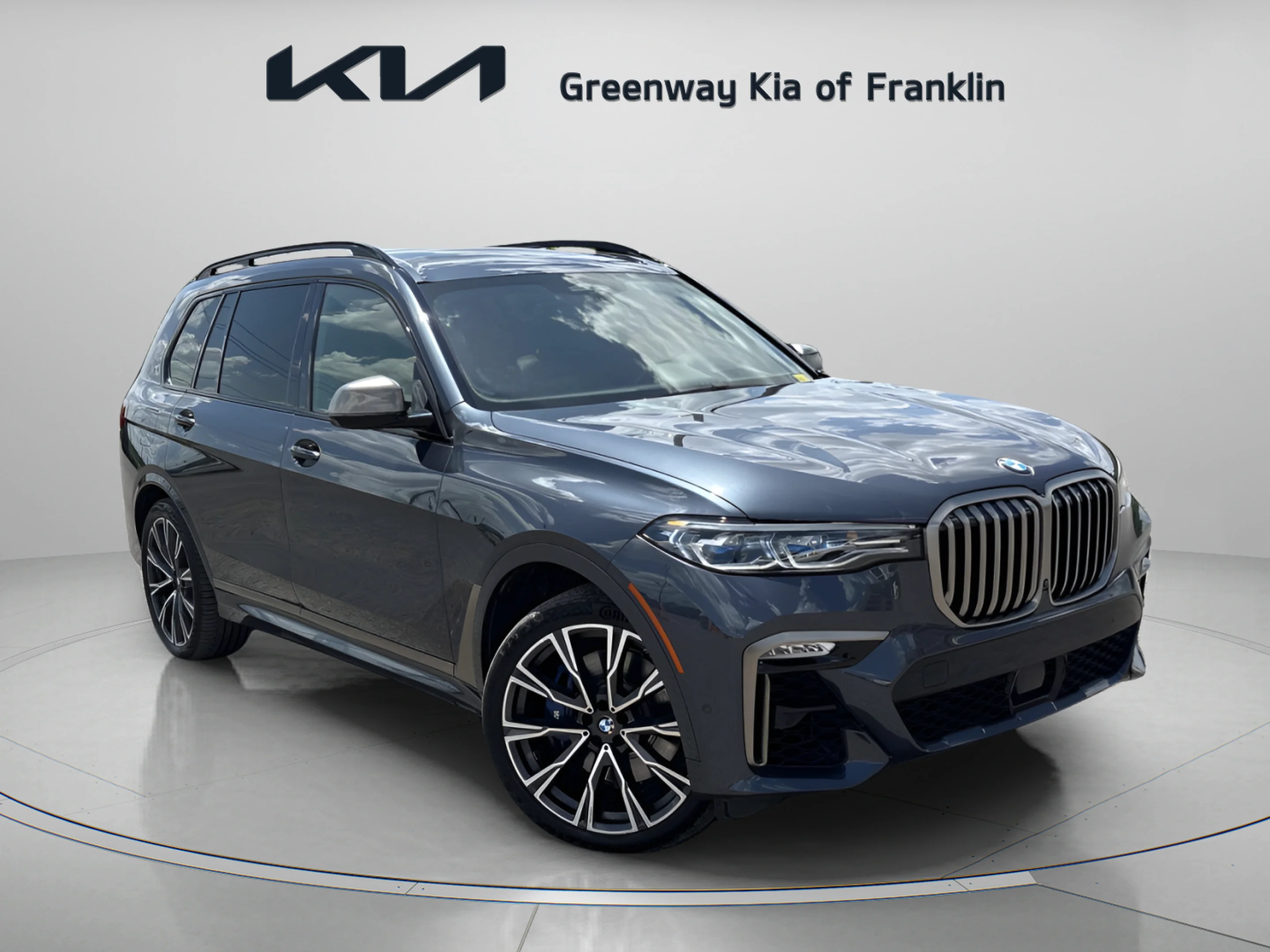Used 2022 Arctic Grey Metallic BMW M50i image 1