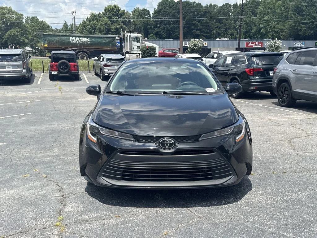 Used 2024 Black Toyota LE image 2