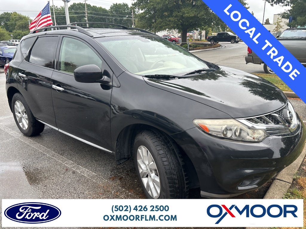 Used 2011 Super Black Nissan SL image 1