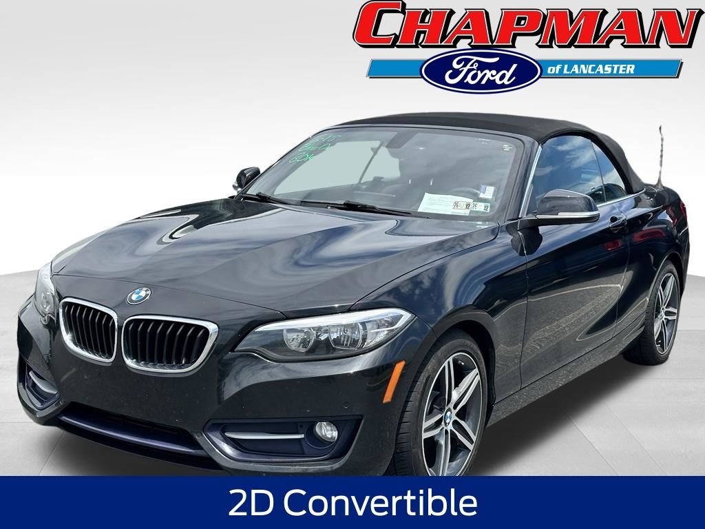 Used 2017 Black Sapphire Metallic BMW 230i xDrive image 1