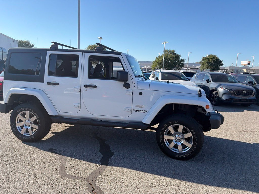 Used 2013 White Jeep Unlimited Sahara image 8