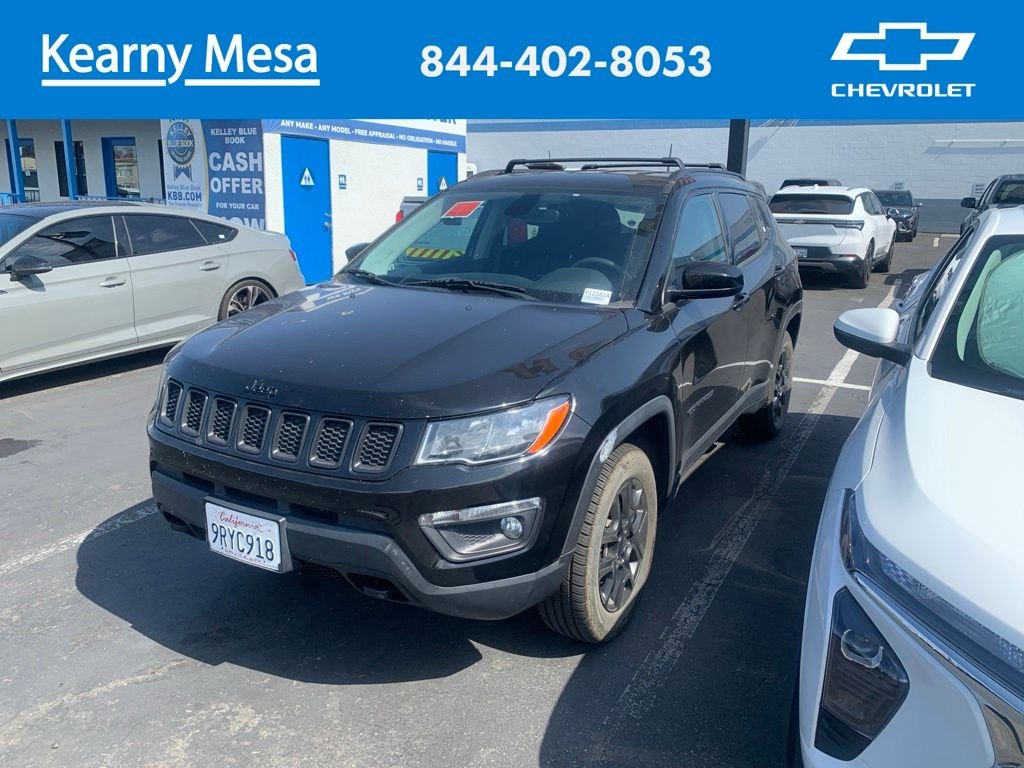 Used 2021 Black Jeep Sport image 1