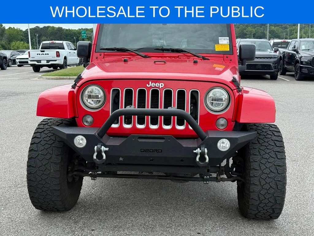 Used 2016 Red Jeep Unlimited Sahara image 21