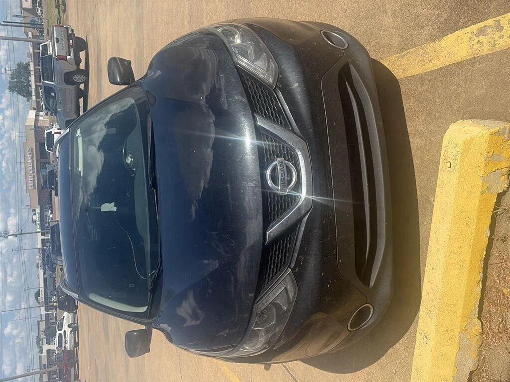 Used 2017 Magnetic Black Nissan SL image 1