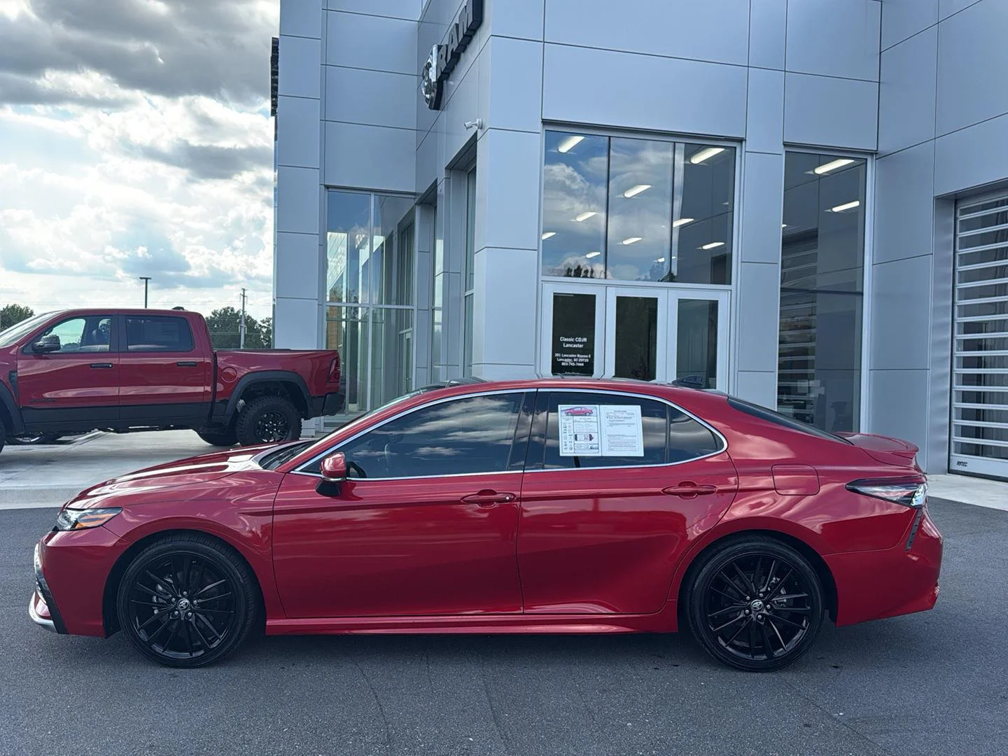 Used 2024 Supersonic Red Toyota XSE V6 image 9