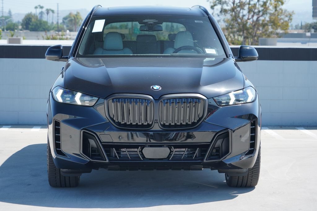 New 2026 Black Sapphire Metallic BMW sDrive40i image 2