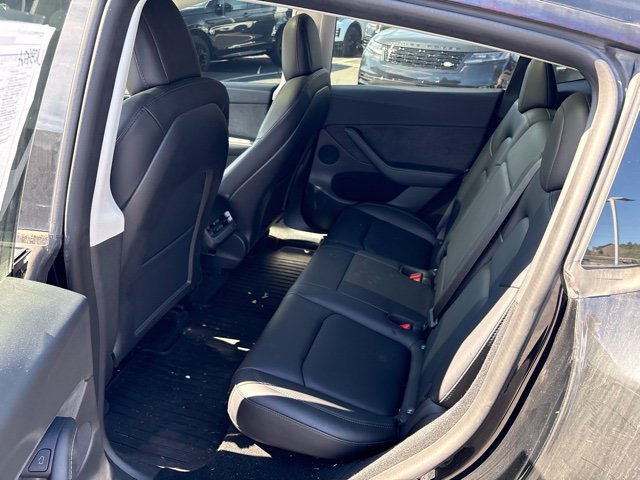 Used 2023 Solid Black Tesla Performance image 12