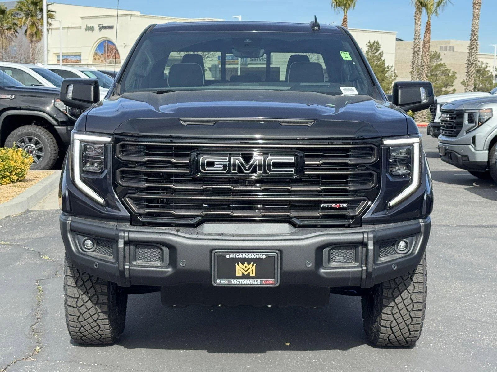 New 2026 TITANIUM RUSH METALLIC GMC AT4X image 2
