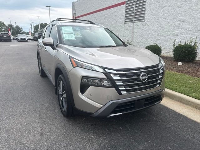 Used 2024 Gold Nissan SL image 1