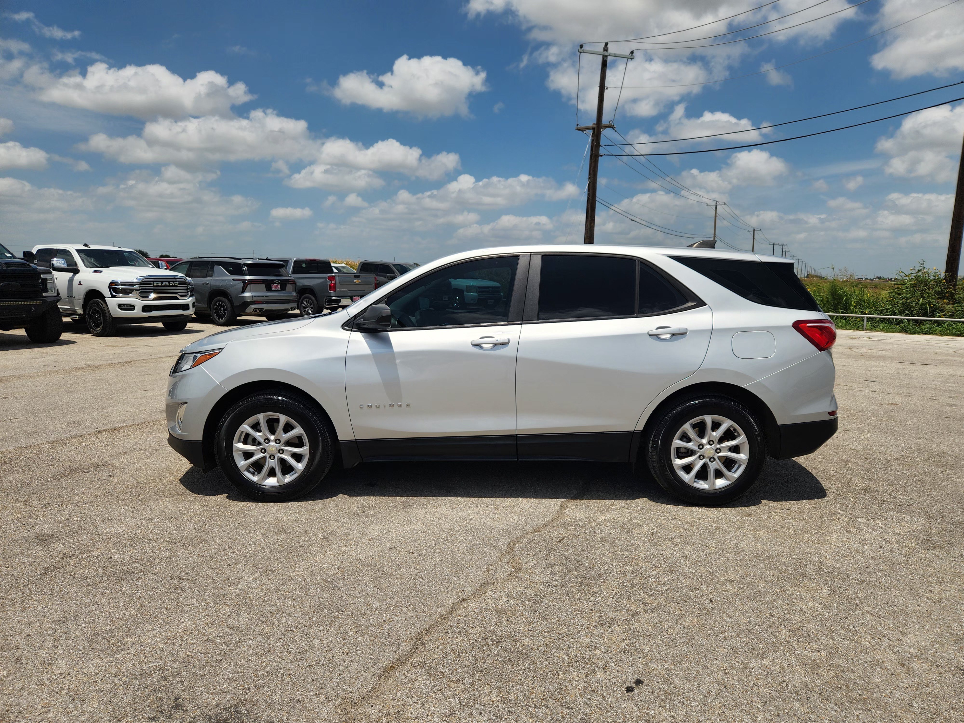 Used 2021 SILVER ICE METALLIC Chevrolet LS image 4