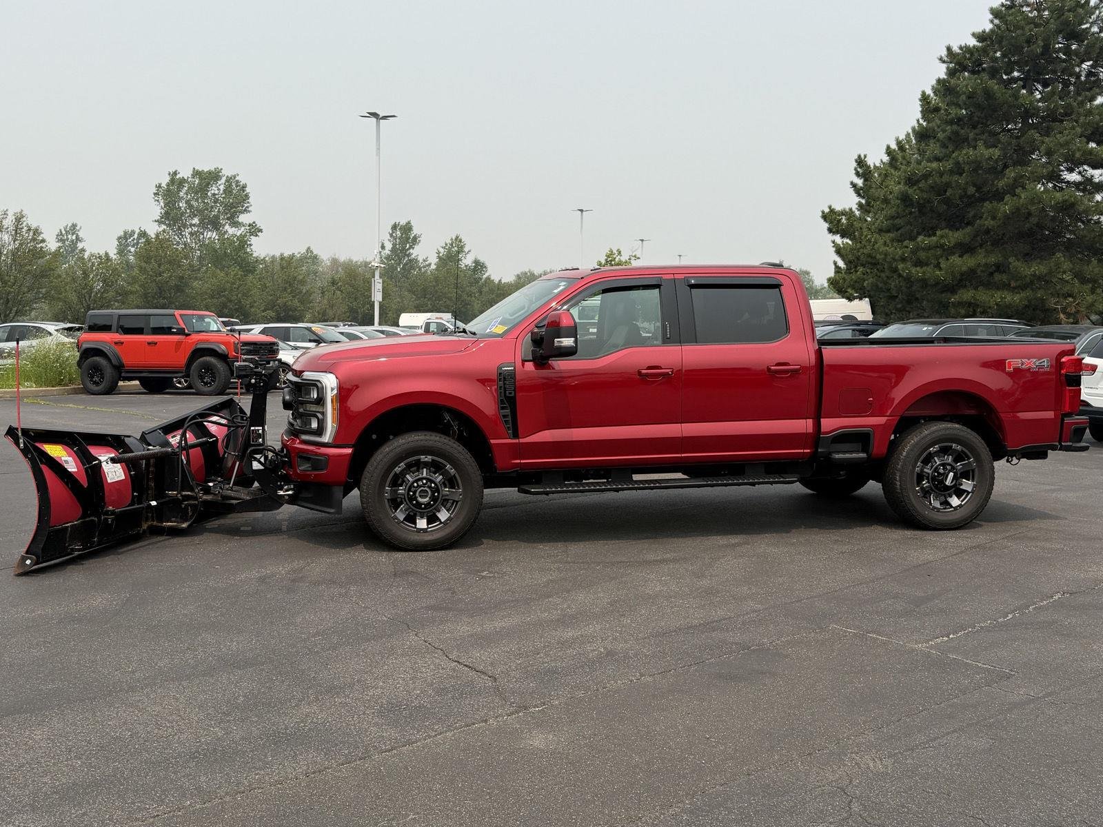 Used 2023 Rapid Red Metallic Tinted Clearcoat Ford Lariat image 2