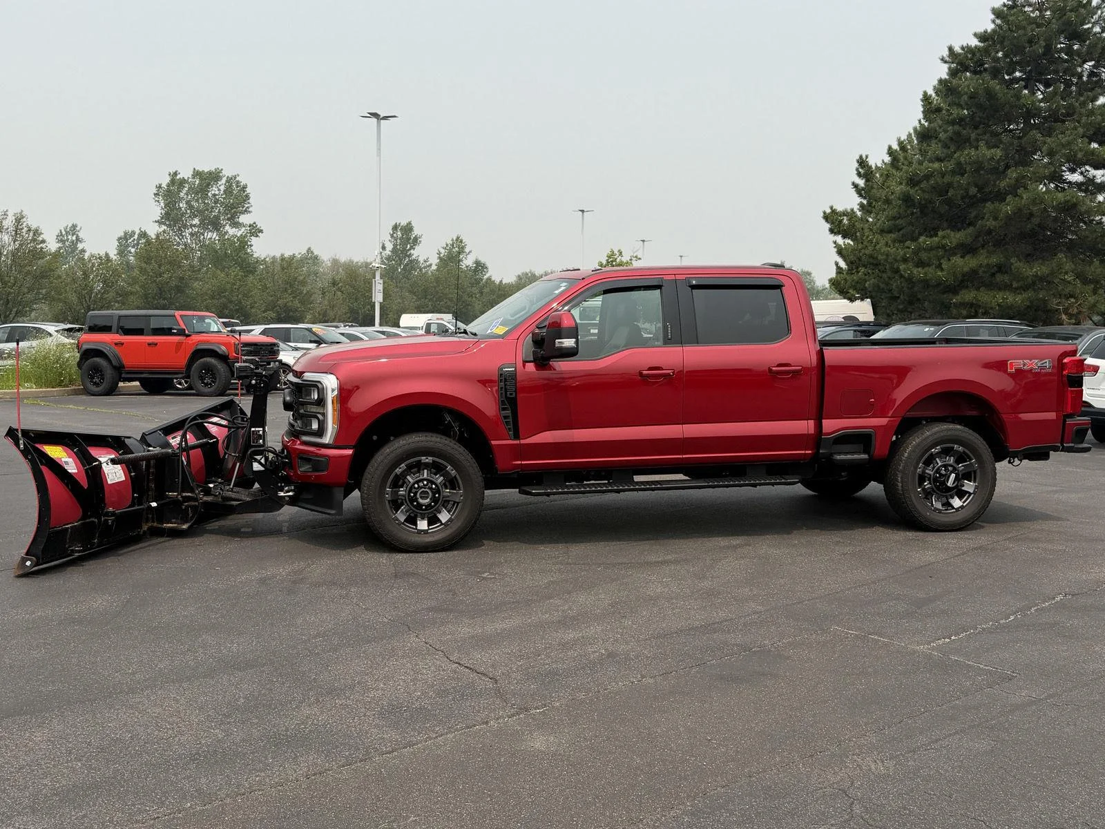 Used 2023 Rapid Red Metallic Tinted Clearcoat Ford Lariat image 2