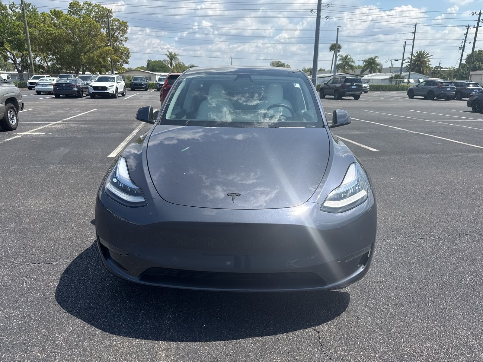 Used 2022 Tesla Model Y Long Range with VIN 7SAYGDEE9NF389999 for sale in Port Richey, FL