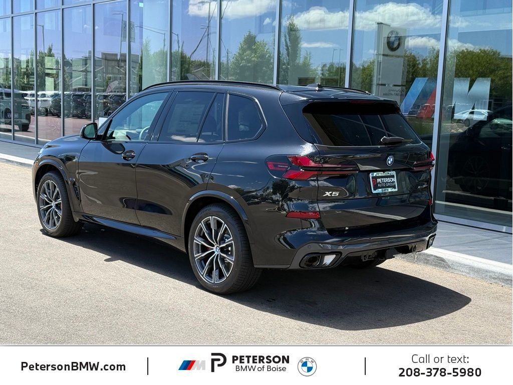 New 2026 Black Sapphire Metallic BMW xDrive50e image 3