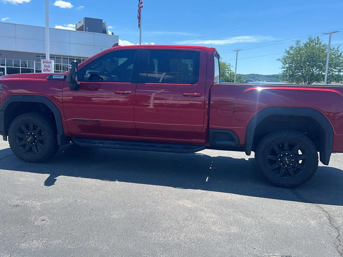 Used 2024 Volcanic Red Tintcoat GMC AT4 image 14