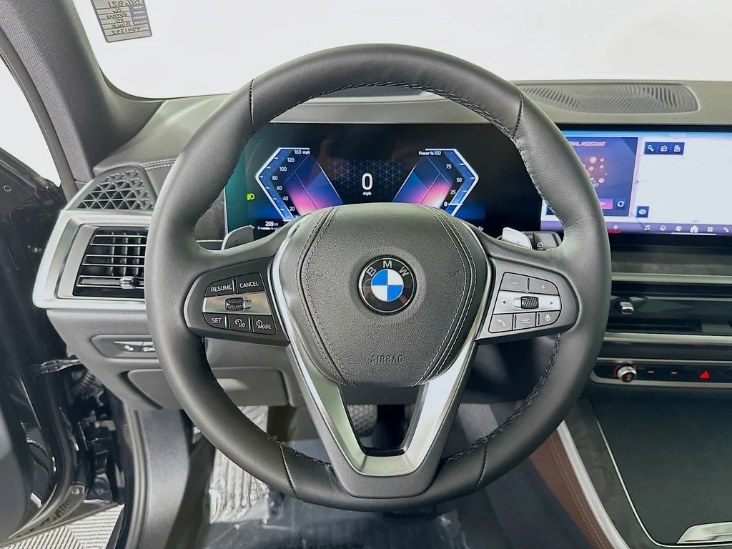 New 2026 Black Sapphire Metallic BMW xDrive40i image 11