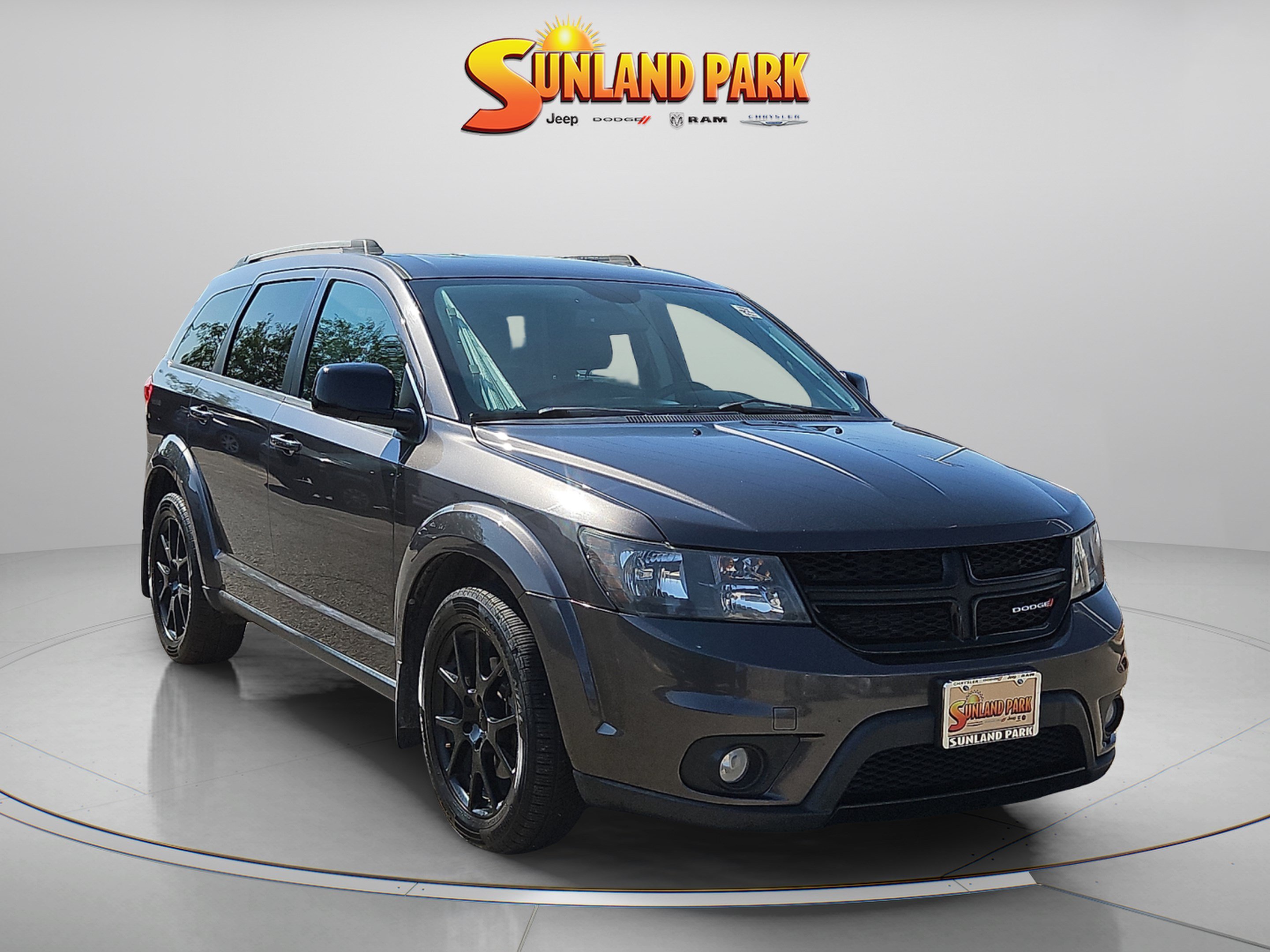 Used 2017 Granite Pearlcoat Dodge GT image 1