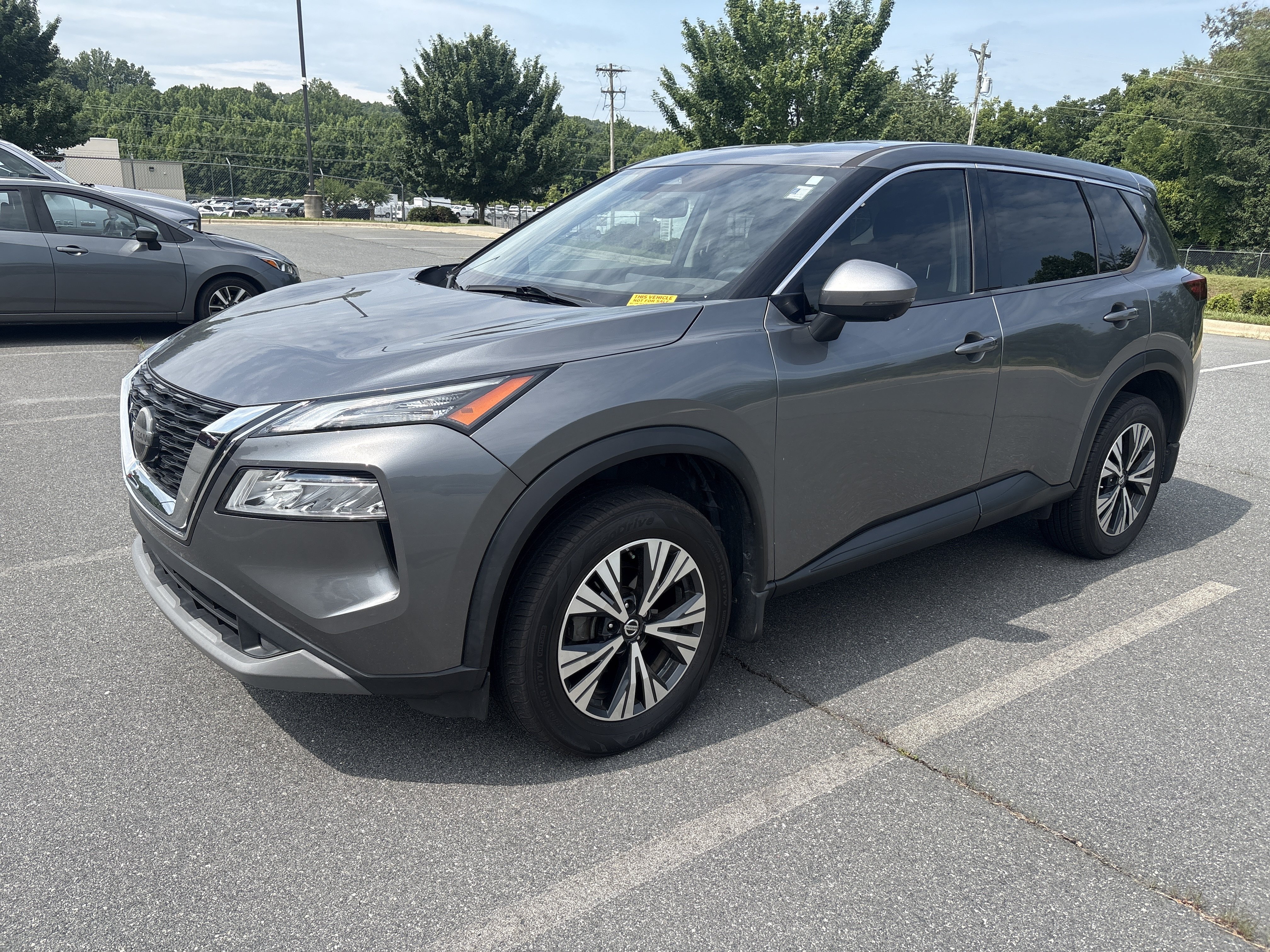 Used 2021 Gun Metallic Nissan SV image 1