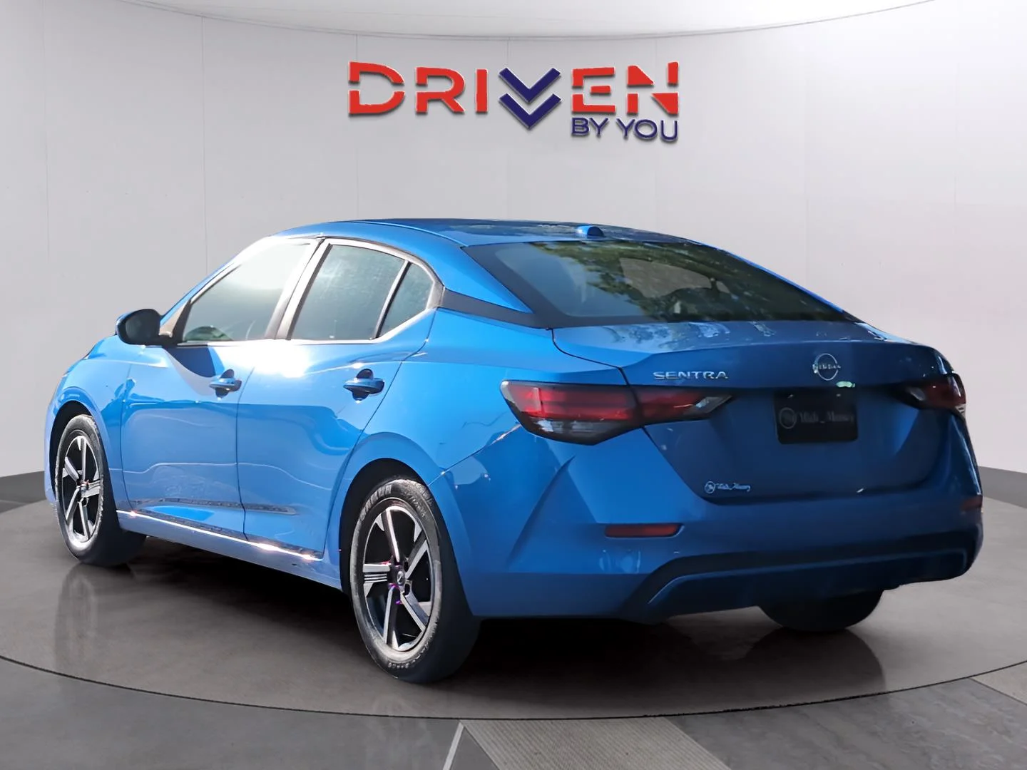 Used 2024 Electric Blue Metallic Nissan SV image 3
