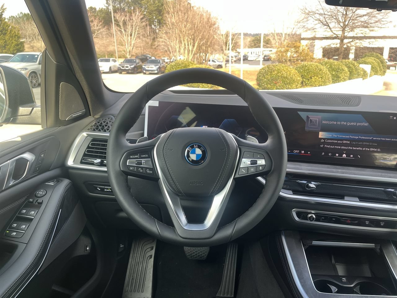 Used 2026 Blue Ridge Mountain Metallic BMW xDrive50e image 21