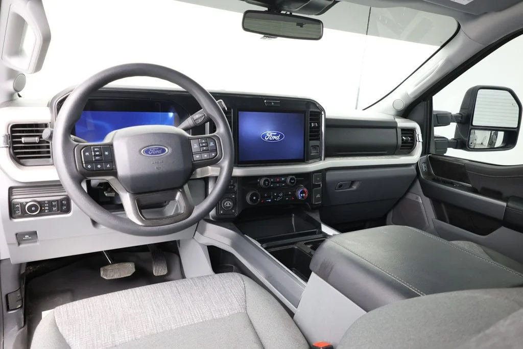 Used 2025 Carbonized Gray Metallic Ford XLT 4WD Crew Cab 6.75