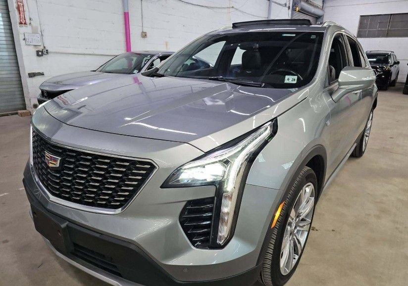Used 2023 Silver Cadillac Premium Luxury image 1