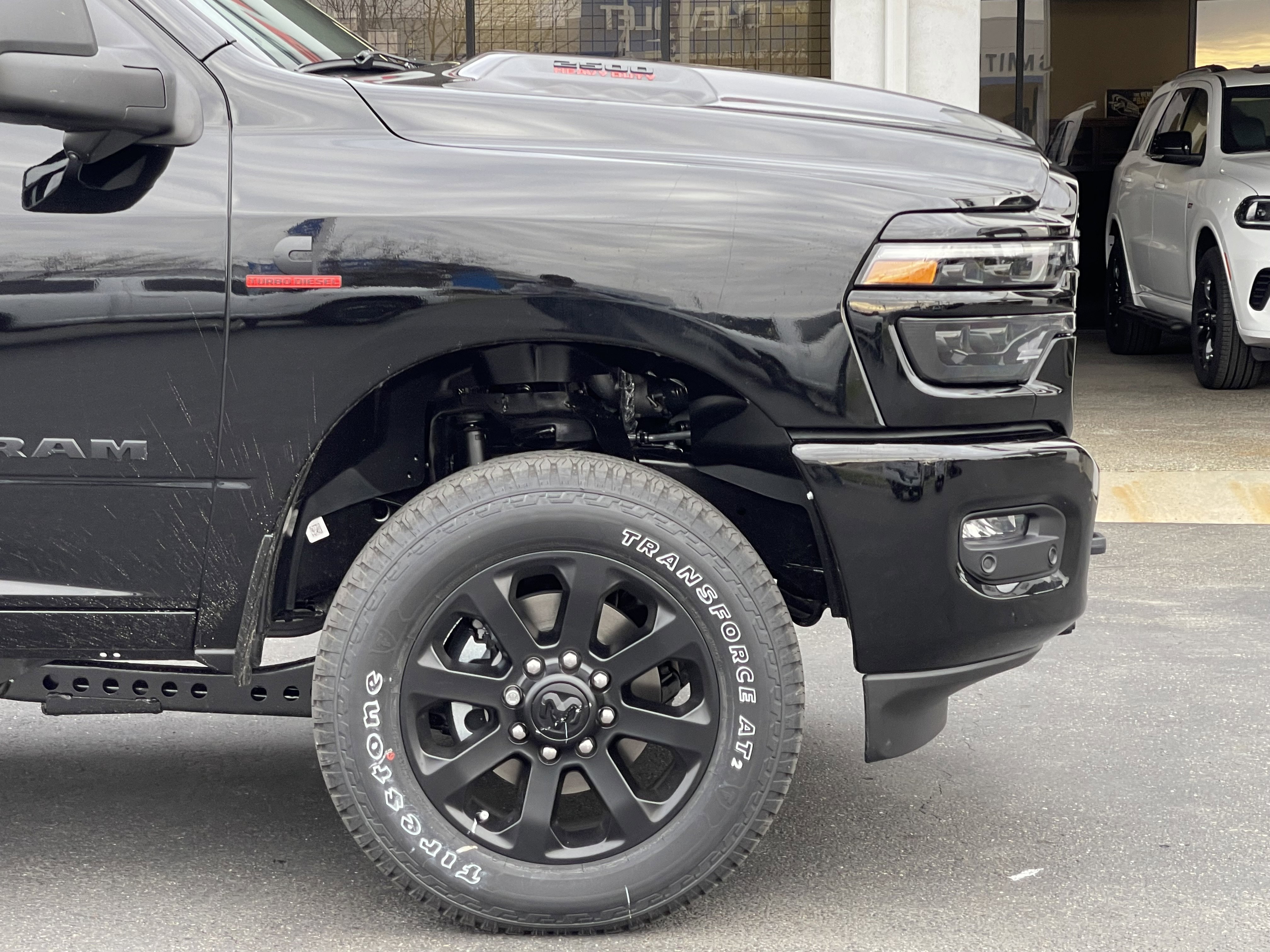 New 2026 Diamond Black Crystal Pearl-Coat Exterior Paint RAM Laramie image 8