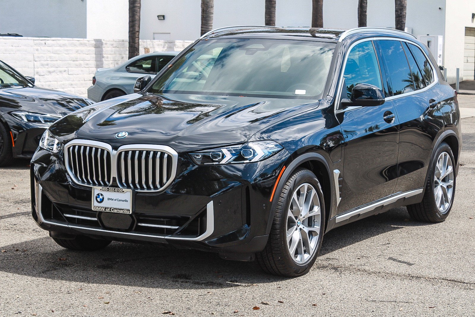 Used 2026 Black Sapphire Metallic BMW xDrive50e image 3