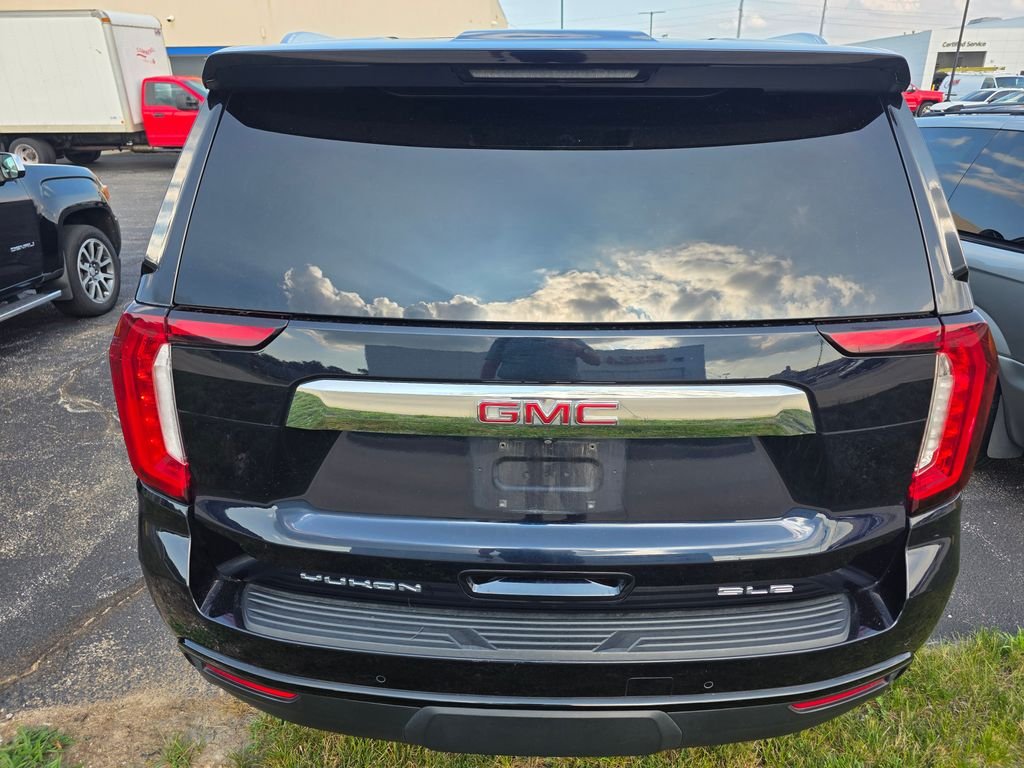Used 2024 Midnight Blue Metallic GMC SLE image 2