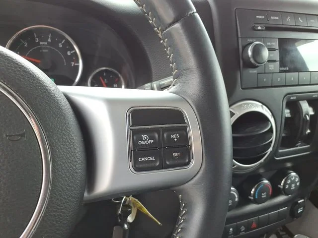 Used 2015 White Jeep Unlimited Sport image 24