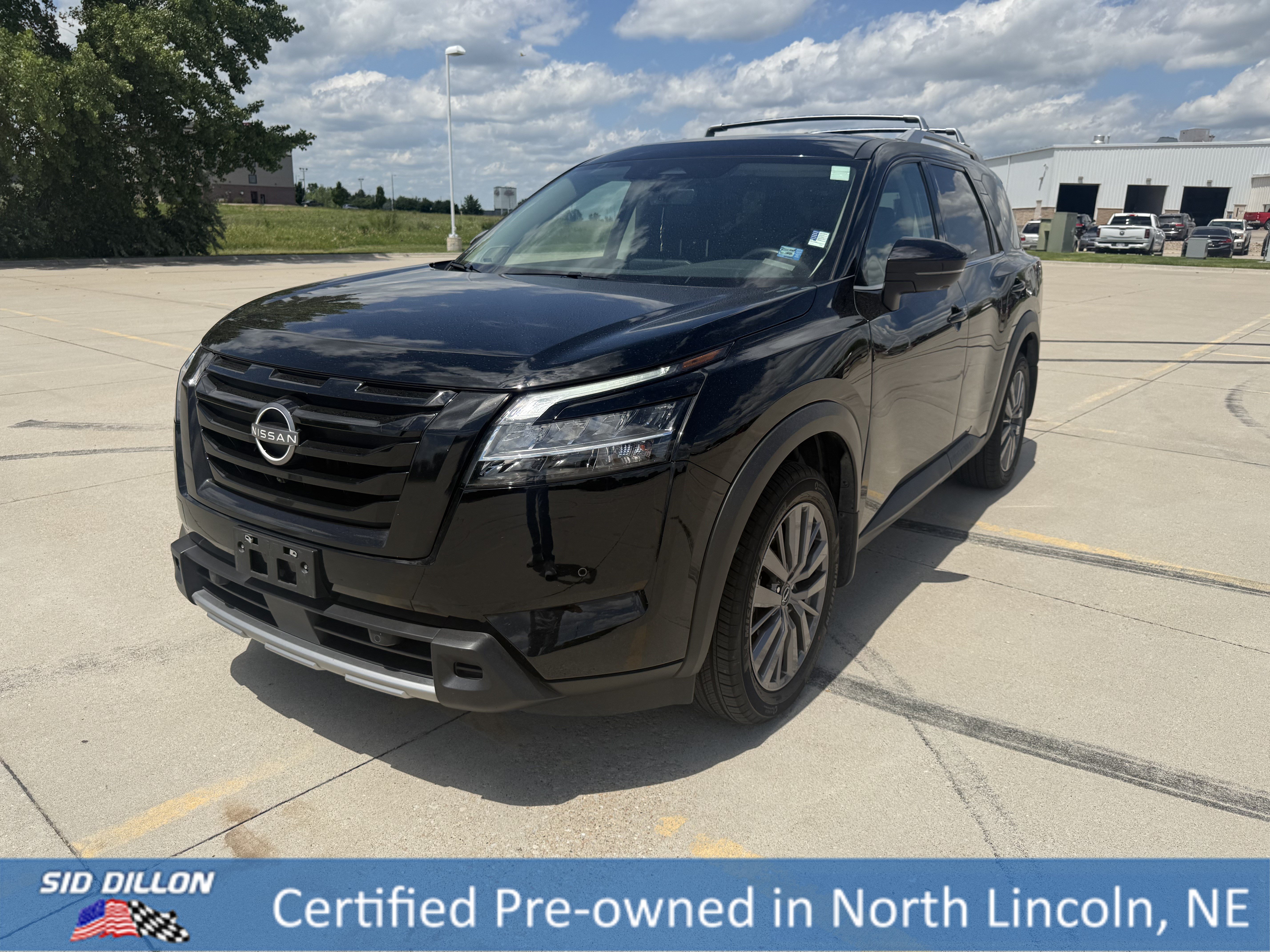 Used 2023 Super Black Nissan SL image 1