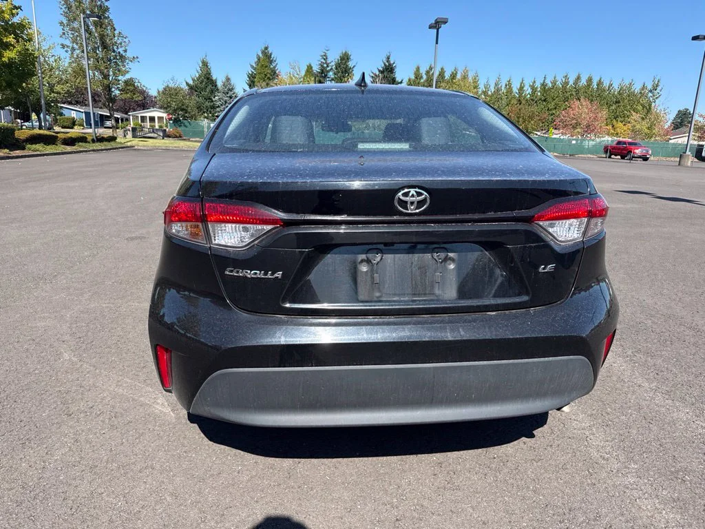 Used 2024 Midnight Black Metallic Toyota LE image 6