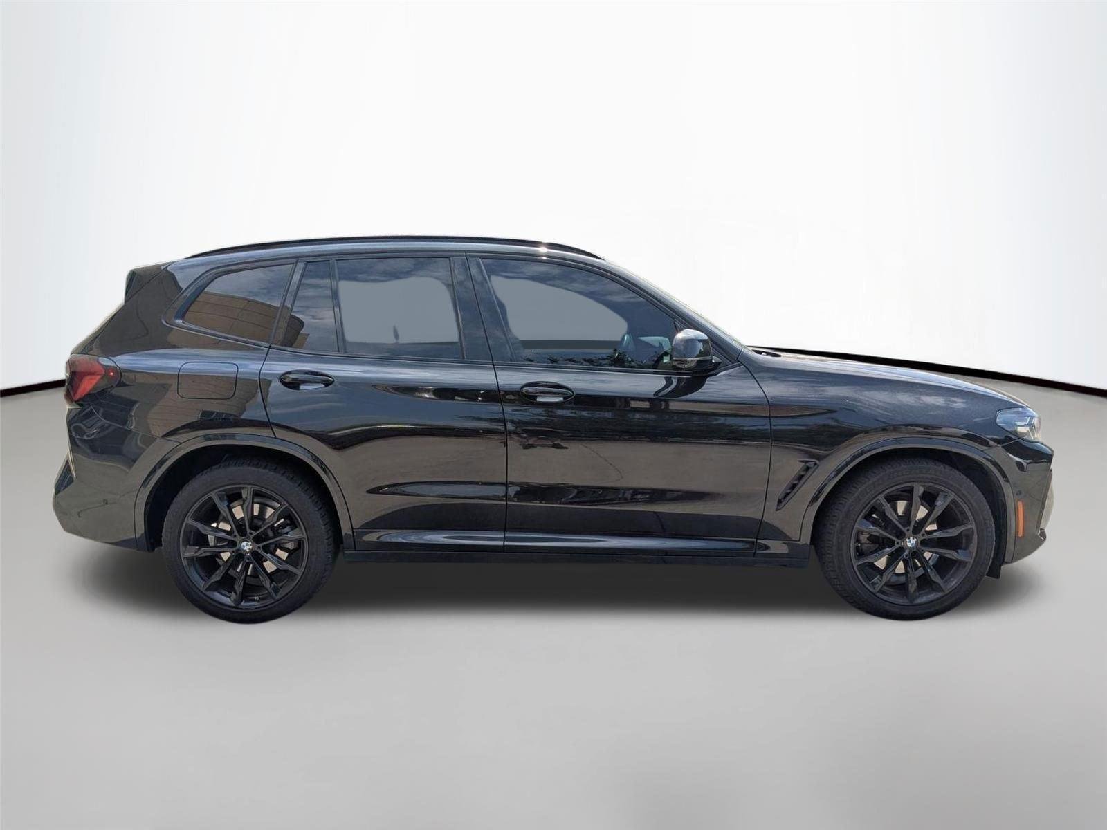 Used 2023 Black Sapphire Metallic BMW xDrive30i image 4