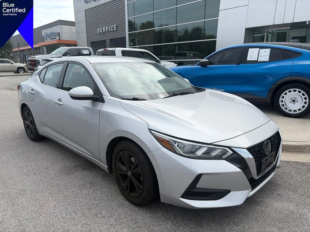 Used 2021 Brilliant Silver Metallic Nissan SV image 1