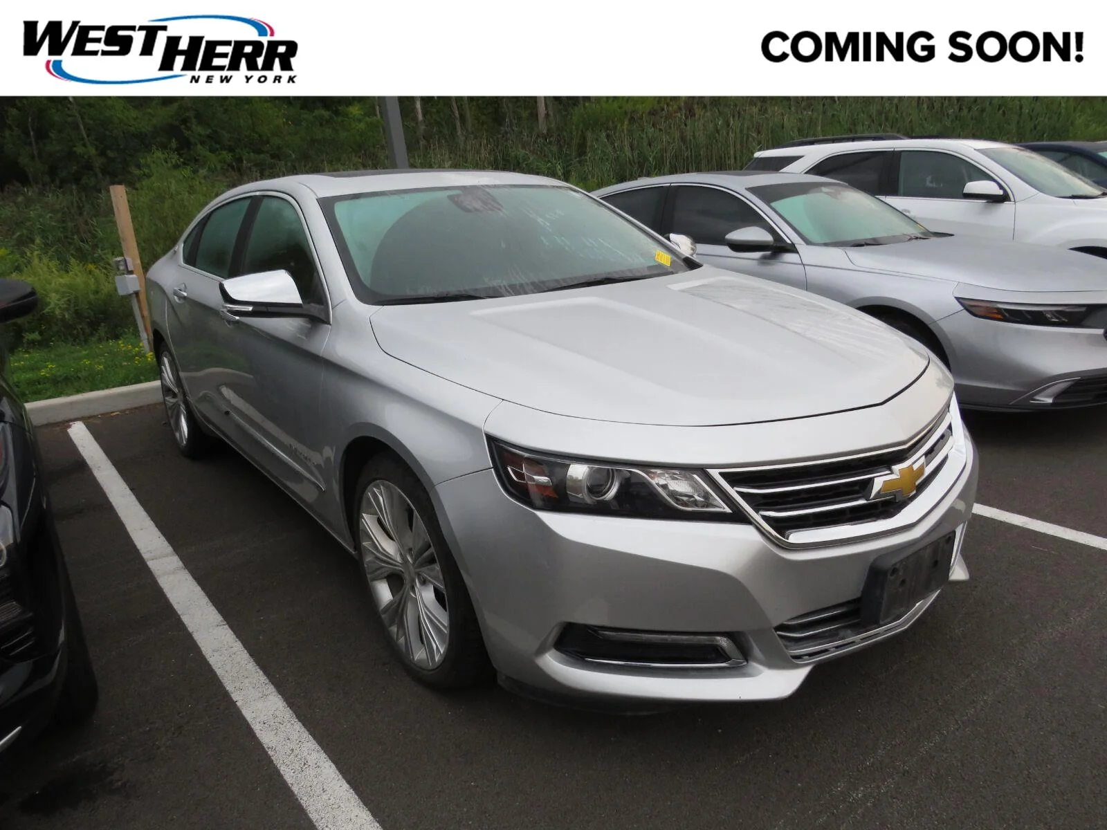 Used 2014 Silver Ice Metallic Chevrolet LTZ image 1
