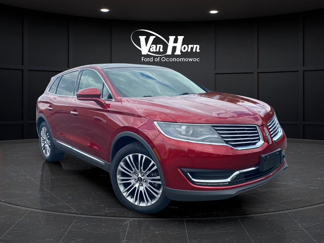 Used 2016 Ruby Red Metallic Lincoln Reserve image 1