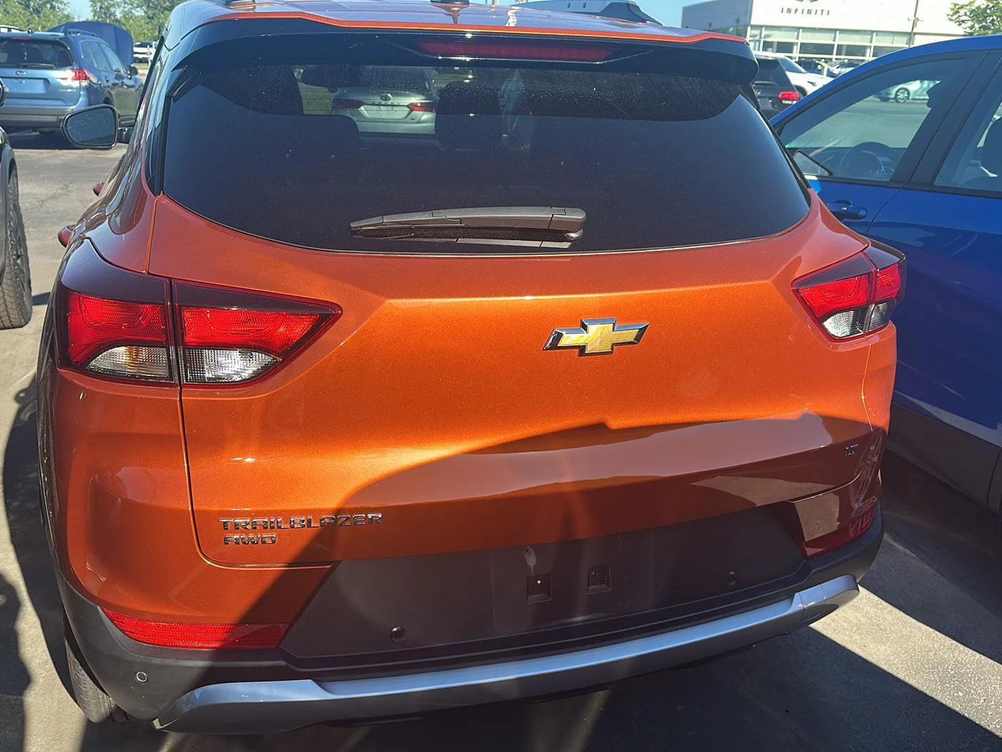 Used 2023 Vivid Orange Metallic Chevrolet LT image 3