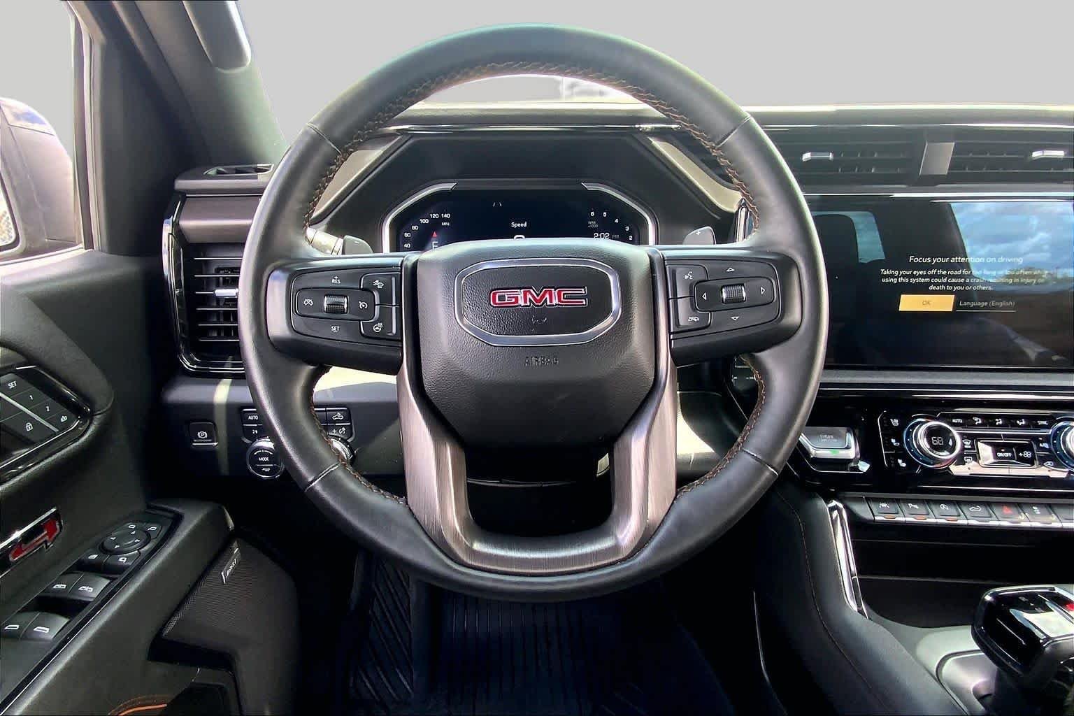 Used 2023 Deep Bronze Metallic GMC AT4 image 6