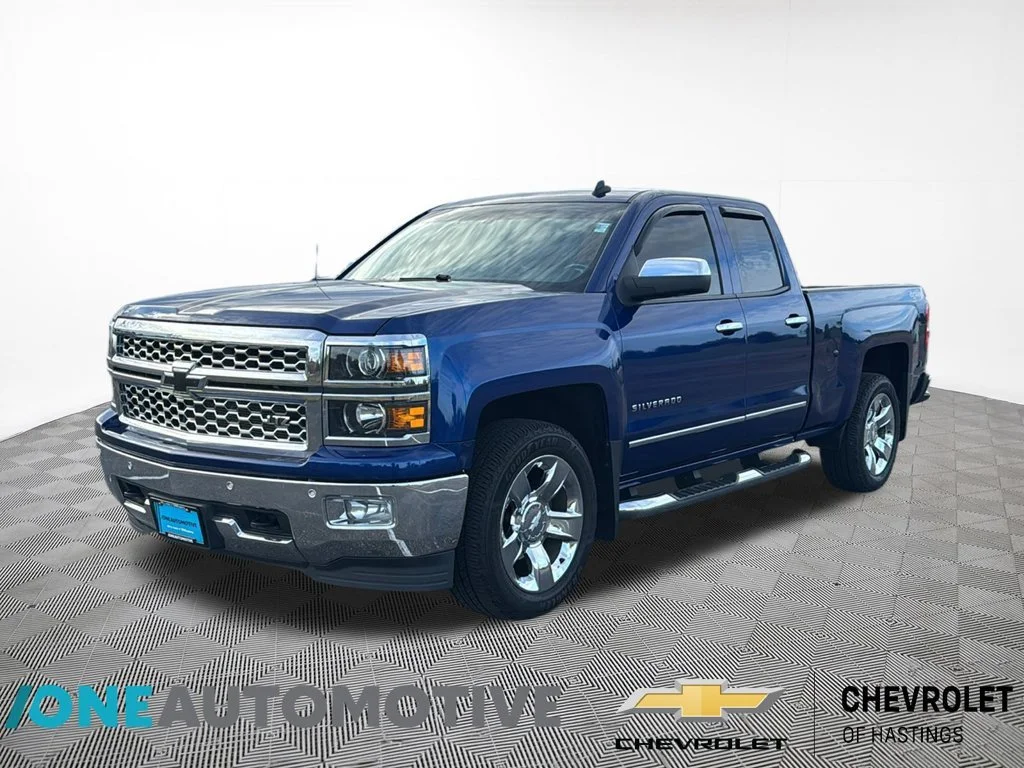 Used 2014 BLUE TOPAZ METALLIC Chevrolet LTZ image 1