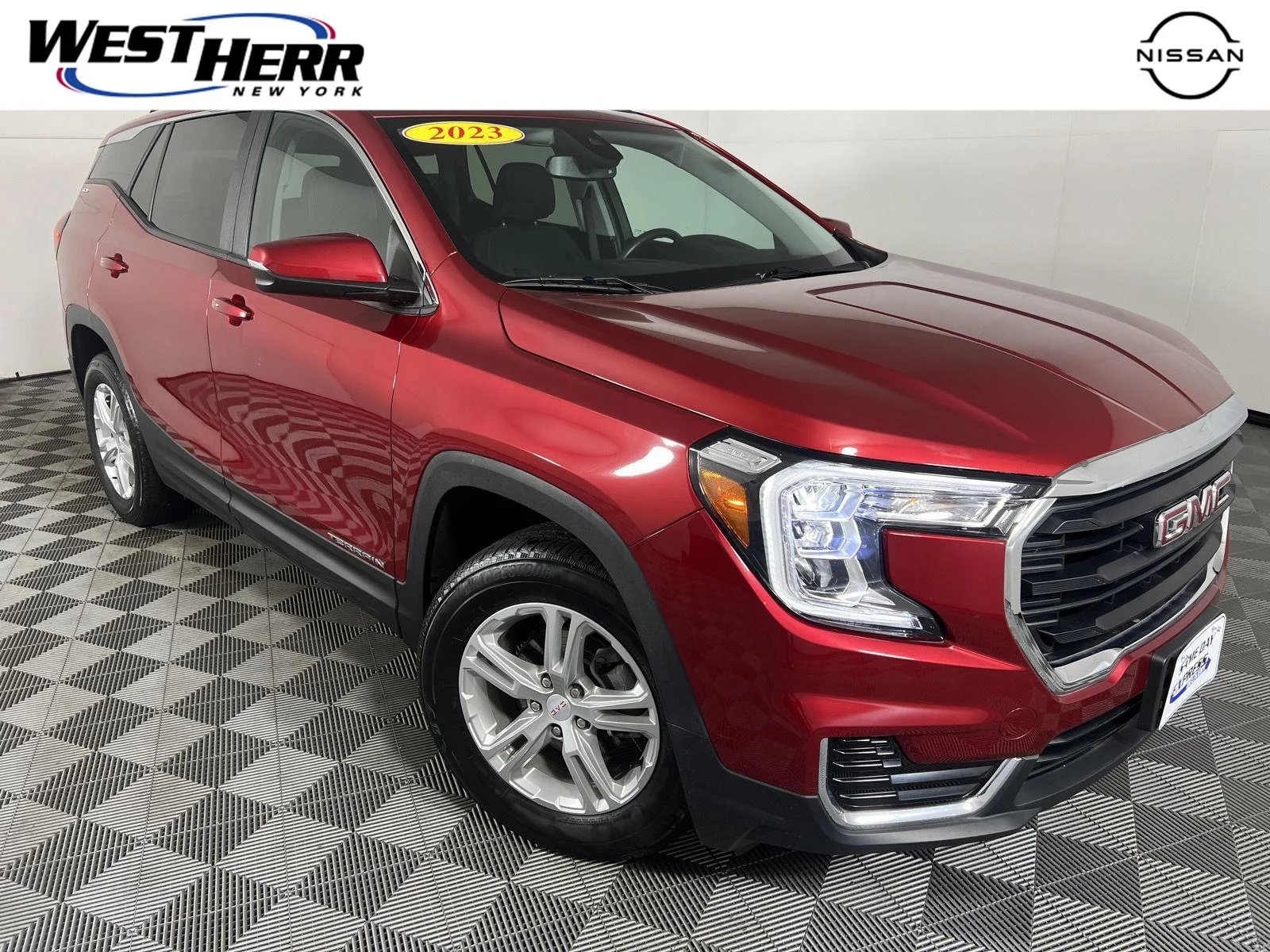 Used 2023 Volcanic Red Tintcoat GMC SLE image 1