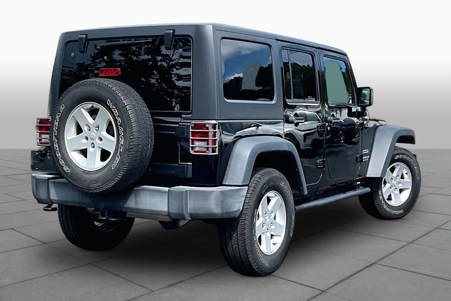 Used 2016 Black Clearcoat Jeep Sport image 12