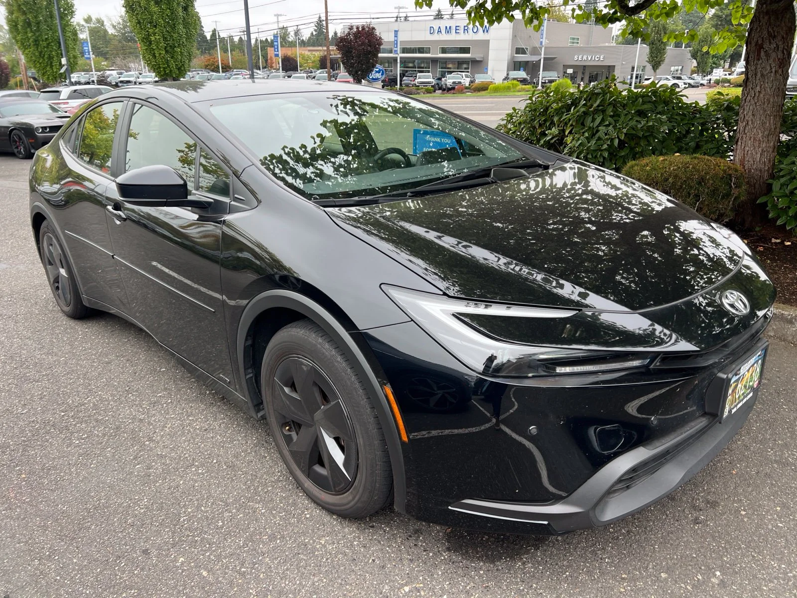 Used 2024 Midnight Black Metallic Toyota LE image 3