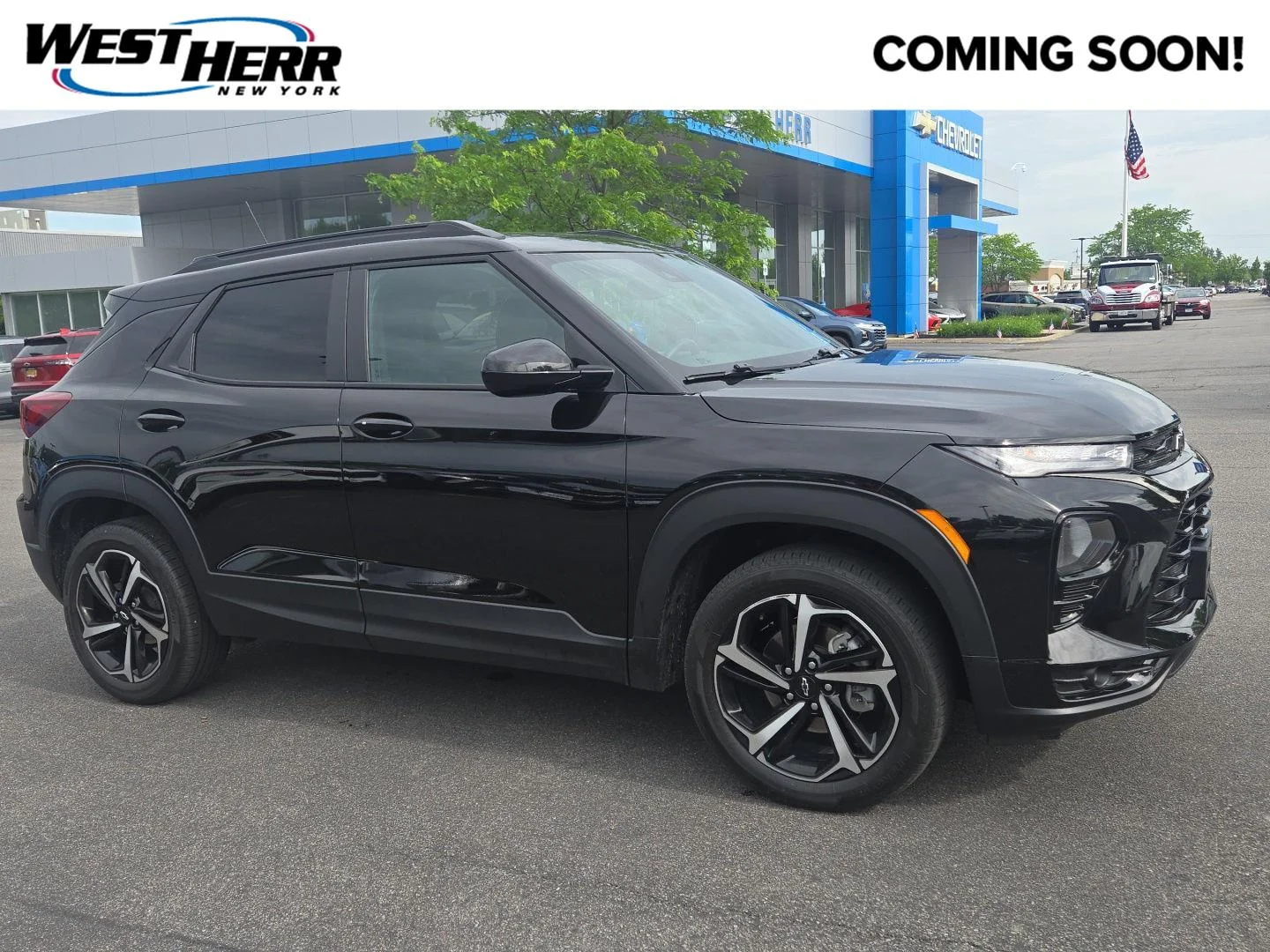 Used 2023 Mosaic Black Metallic Chevrolet RS image 1