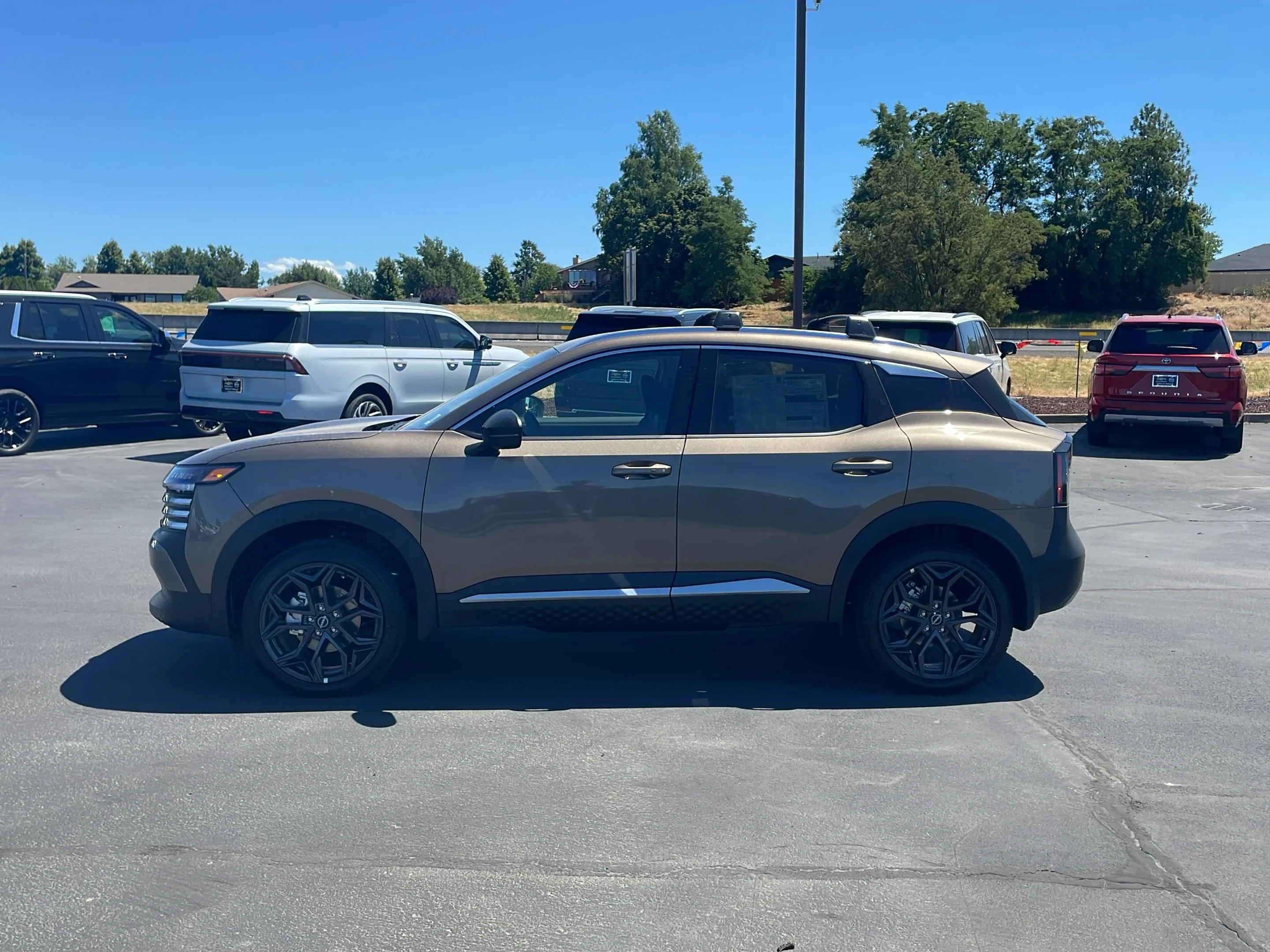 New 2026 Canyon Bronze Metallic Nissan SR image 4