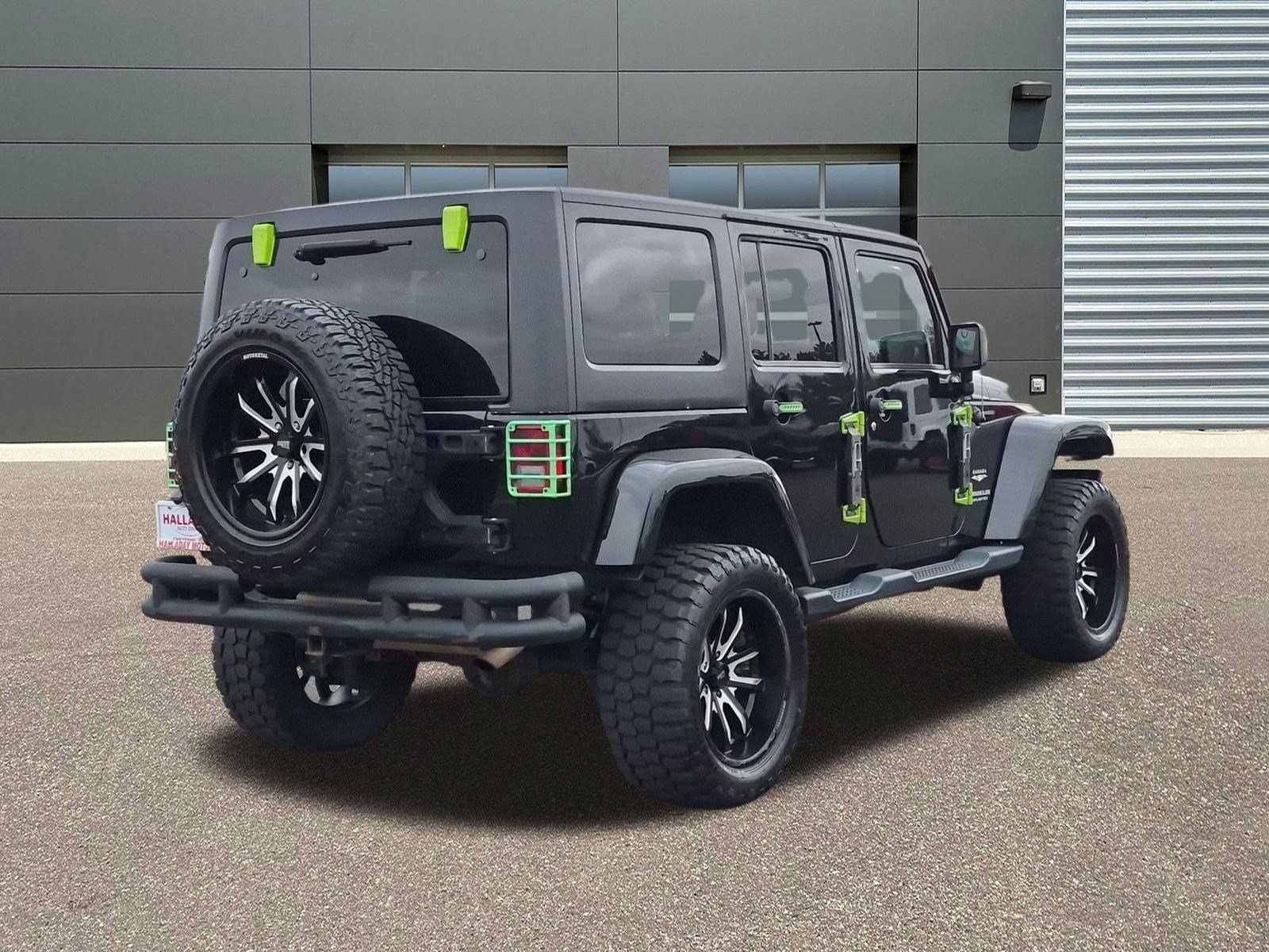 Used 2015 Black Clearcoat Jeep Sahara image 5