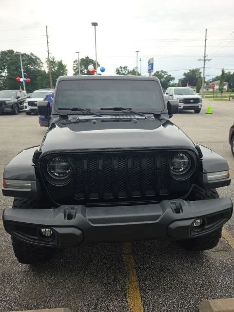 Used 2018 Black Jeep Unlimited Sahara image 2