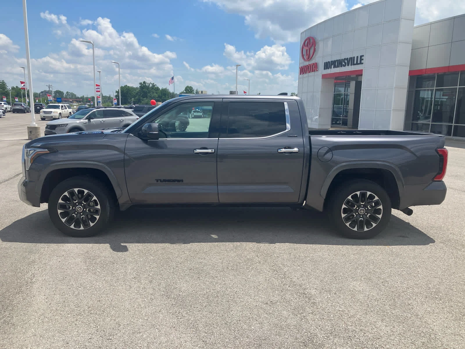 Used 2023 Magnetic Gray Metallic Toyota Limited Hybrid image 4